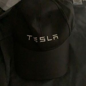 2 short sleeved shirts and a hat medium